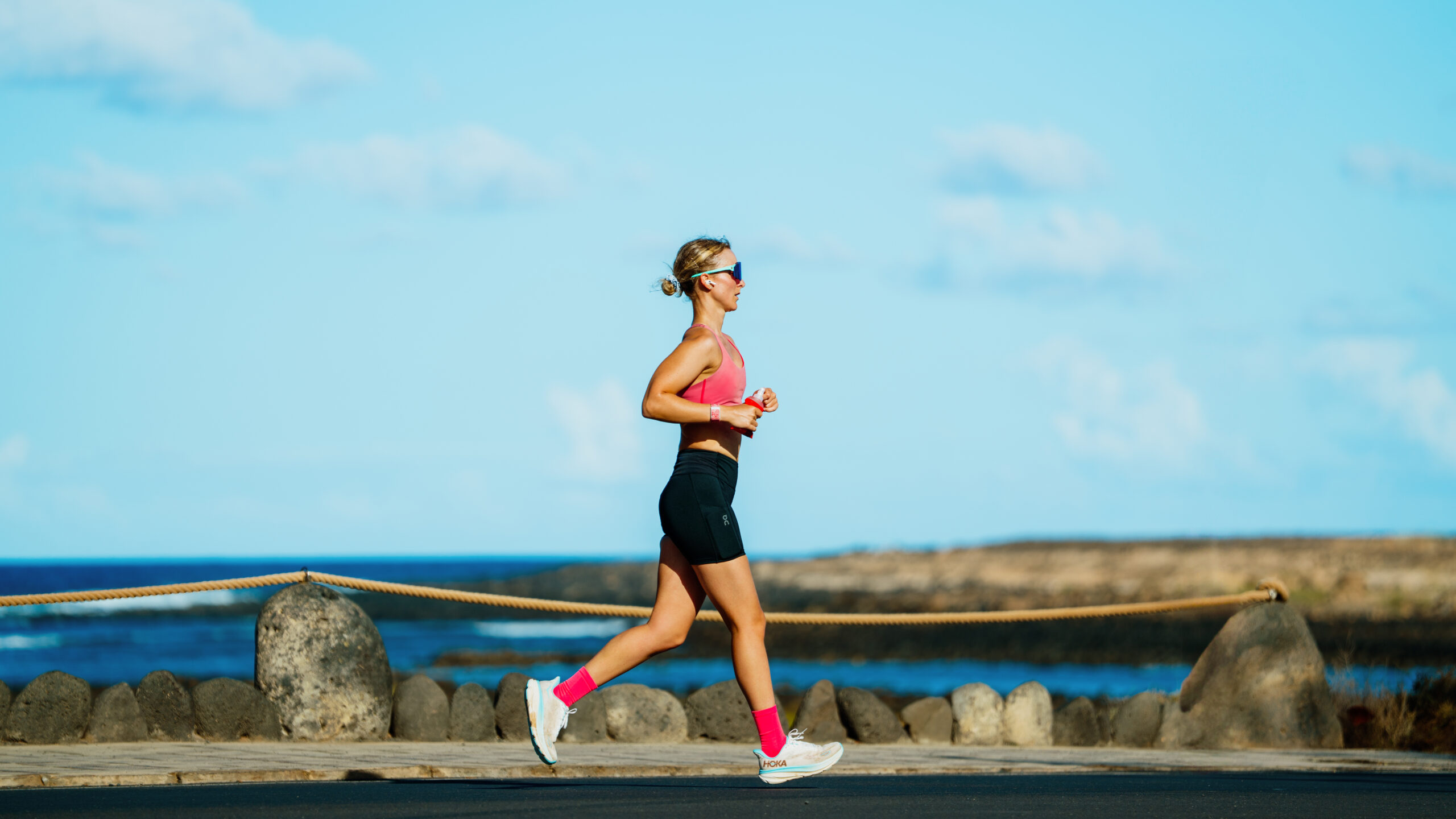 A women tri training at Club La Santa, running around the resort