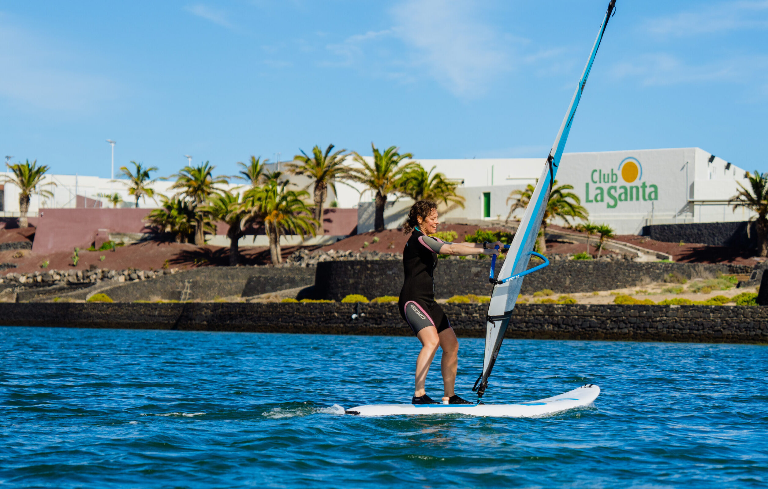 An instructor windsurfing at club la santa