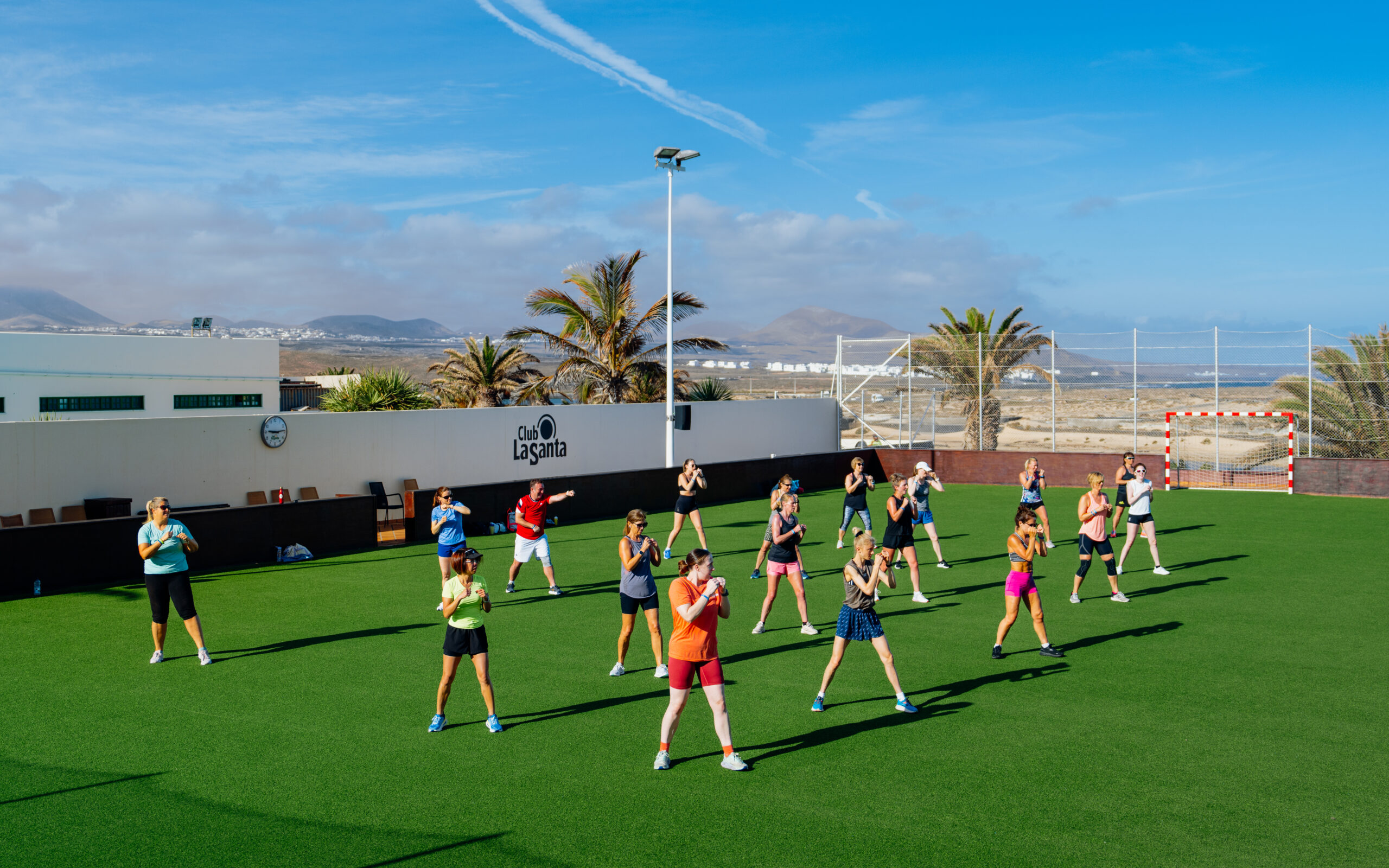 A group taking part in a boxing fitness class at Club La Santa