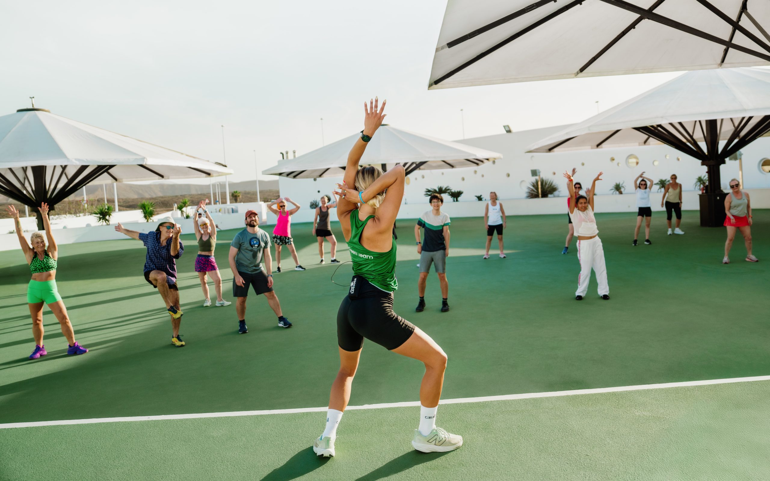 A group of guests taking part in a dance class on their holiday to Club La Santa