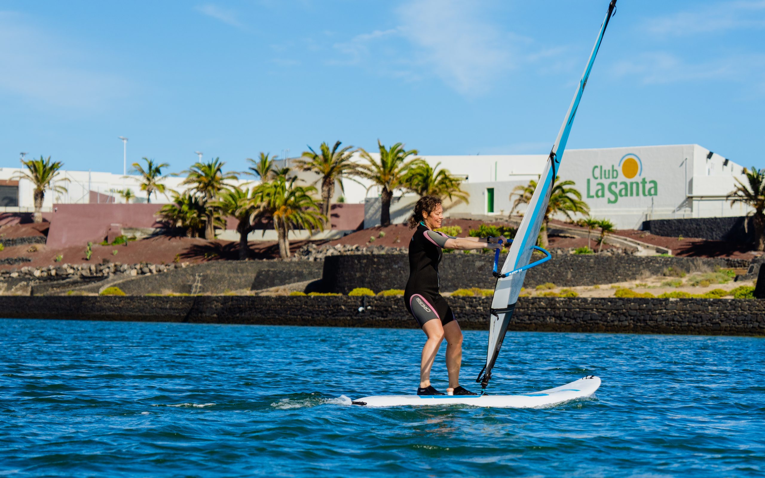 Someone windsurfing at club la santa