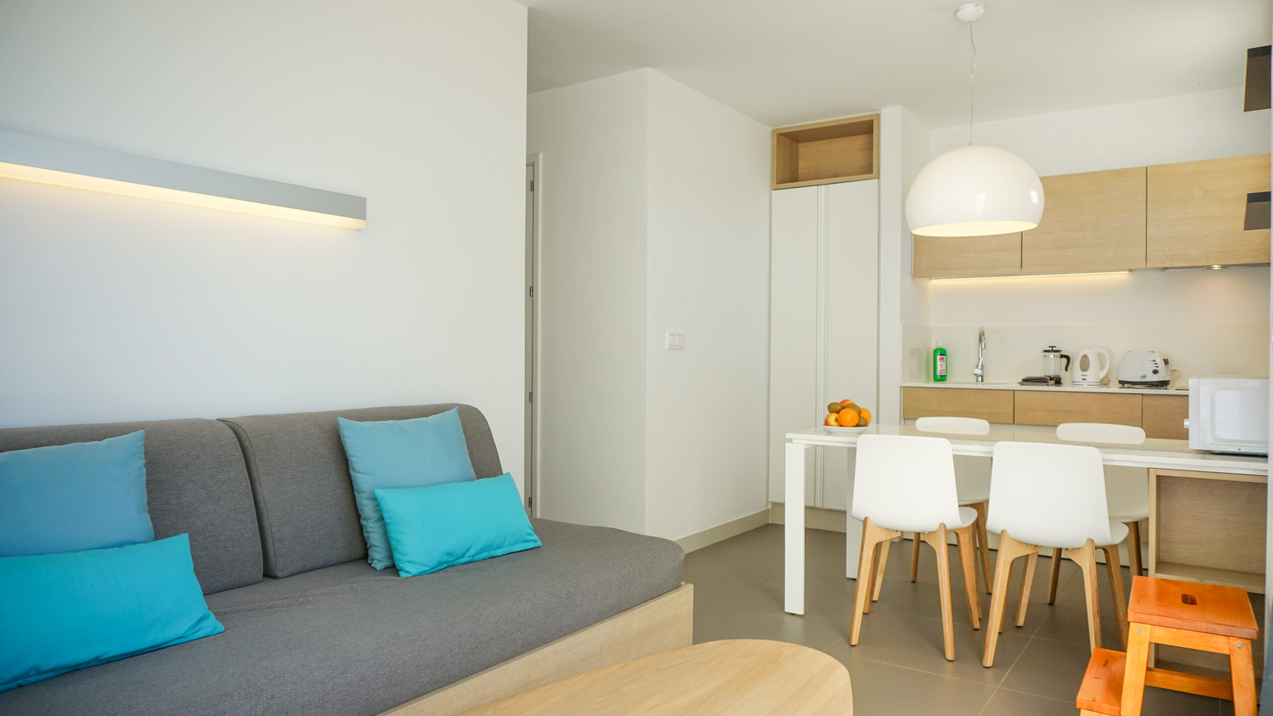Image of Comfort 1 Bedroom 1 Bathroom apartment, showing the kitchen living room