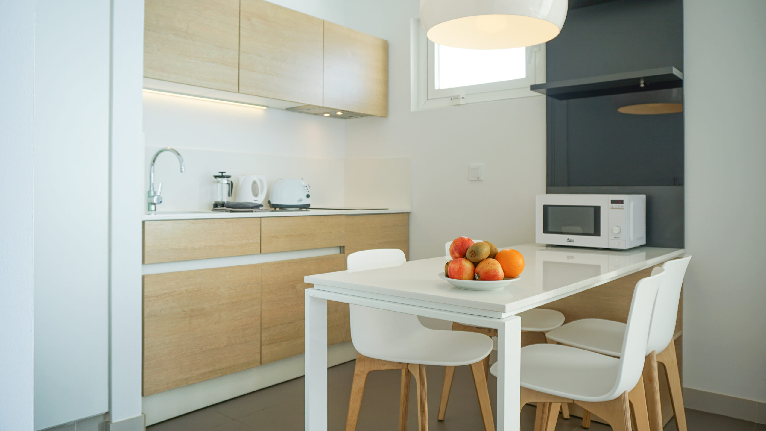 Image of Comfort 1 Bedroom 1 Bathroom apartment, showing the kitchen