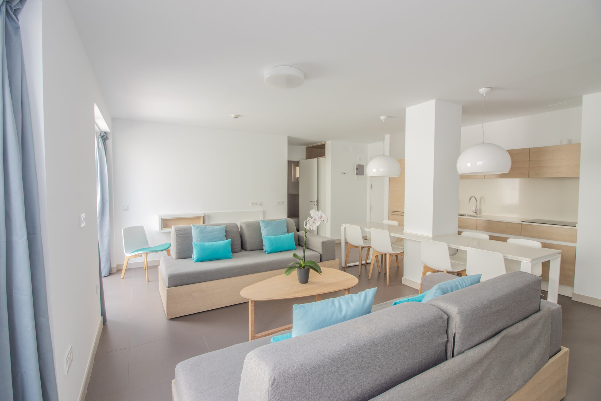 The living room/ kitchen of the comfort 2 bedroom 2 bathroom apartment at Club La Santa.