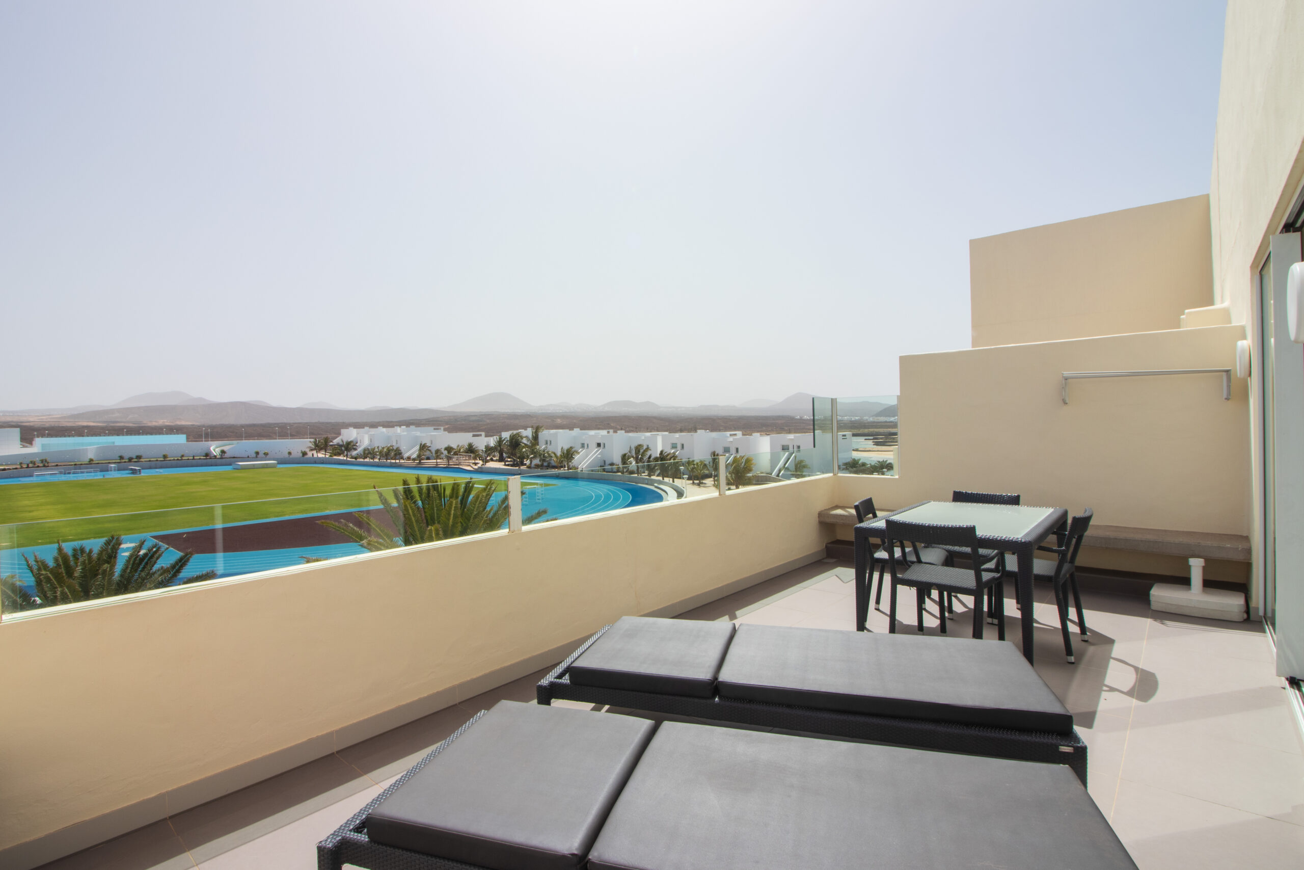 The terrace of the comfort 2 bedroom 2 bathroom apartment with a view at Club La Santa.