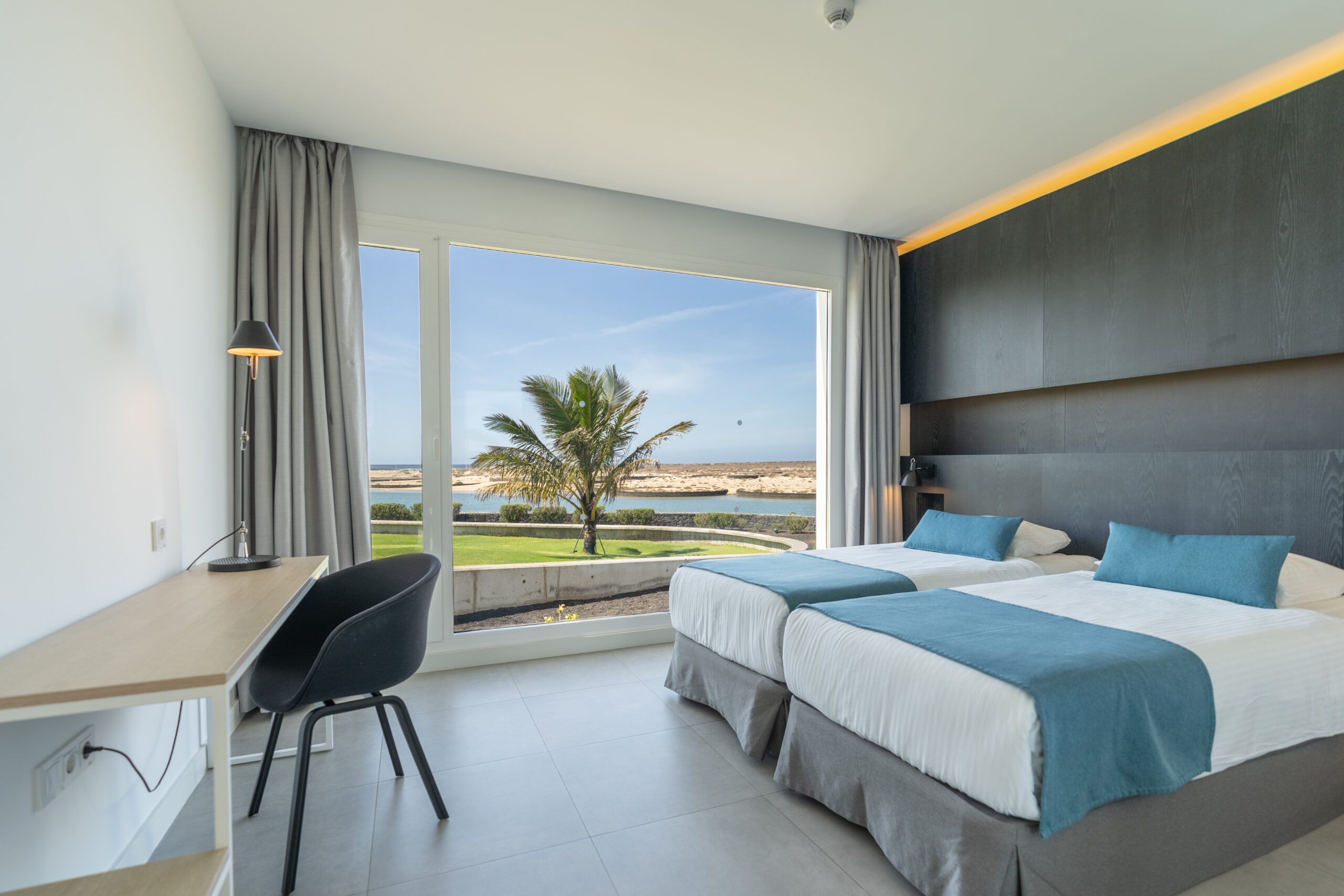 The bedroom of the 2 bedroom 2 bathroom suite with a view at Club La Santa.