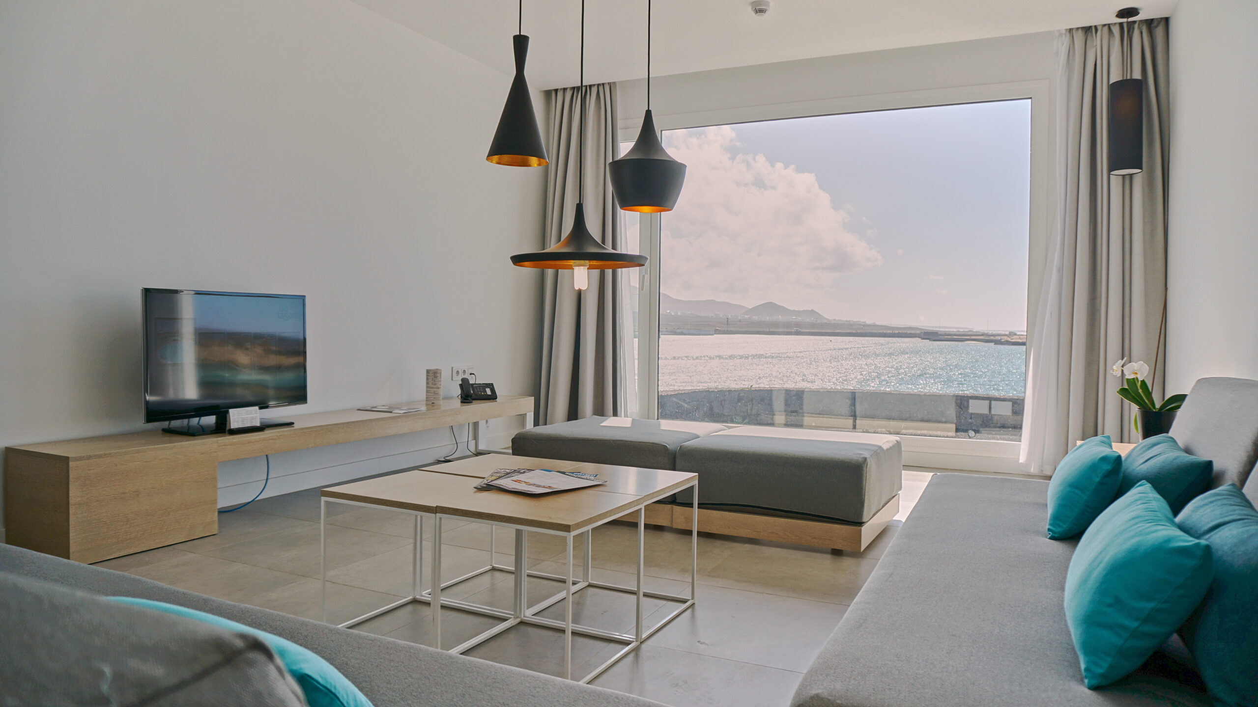 The living room of the 3 bedroom 2 bathroom luxury suite with sea views at Club La Santa.