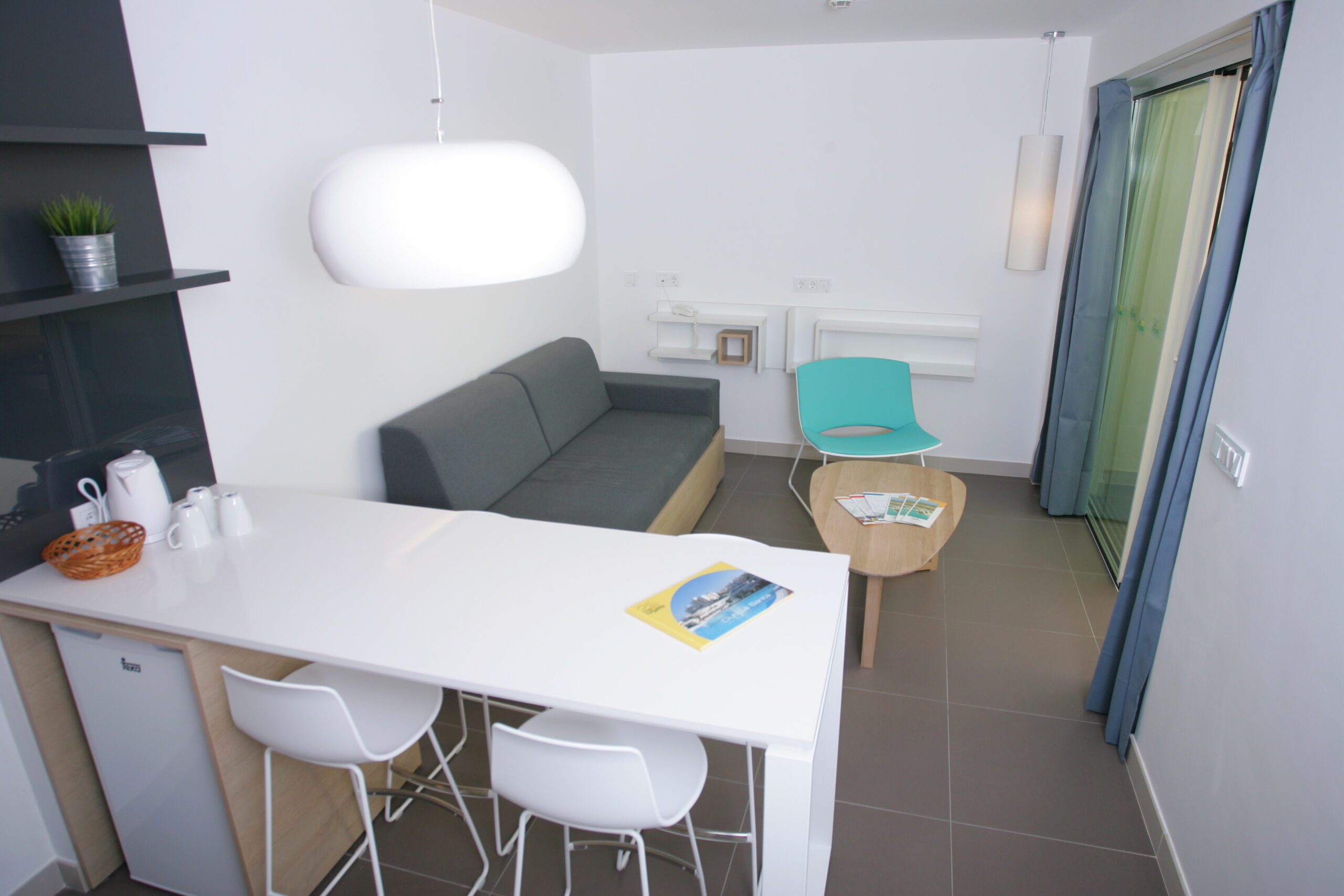 living room/ kitchen of a comfort 1 apartment